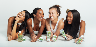 An image of four diverse women with healthy glowing skin enjoying the Bright and Balanced Aloe Vera Skincare line by Urban Hydration