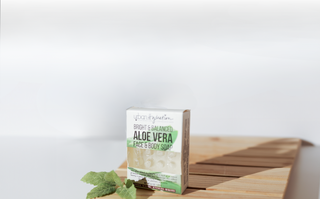 Urban Hydration Bright & Balanced Aloe Vera Face & Body Soap on a Wooden Tray. Natural skincare product for moisturizing and soothing skin. Paraben-free, no sulfates, and phthalate-free soap bar for glowing, healthy skin.